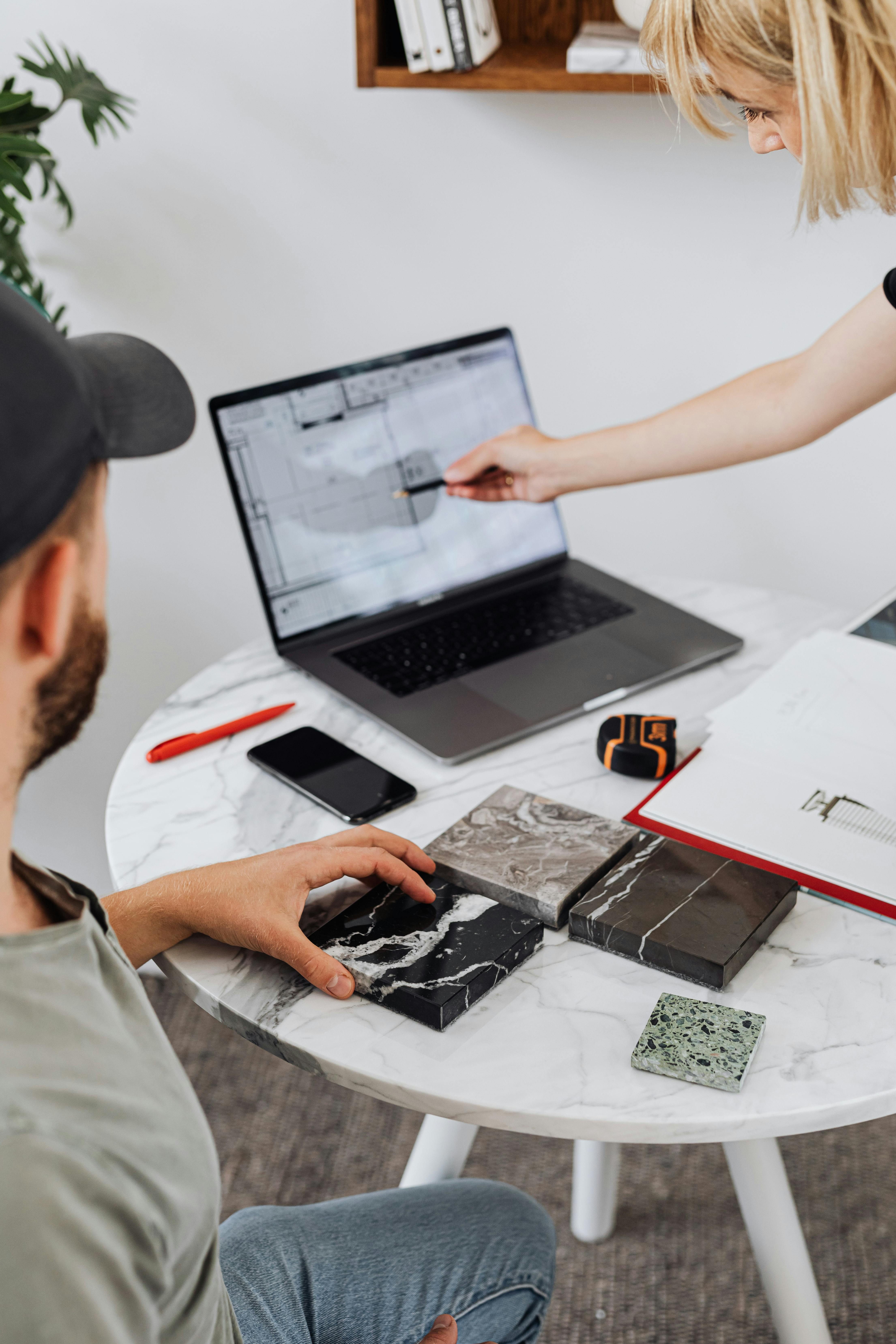Team reviewing a project plan on a laptop